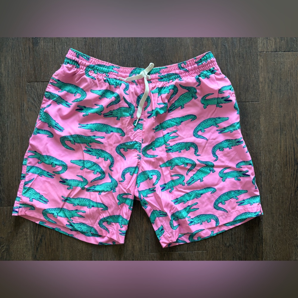 NEW without tags.  Never worn. Size large pink alligator CHUBBIES 7” swim shorts